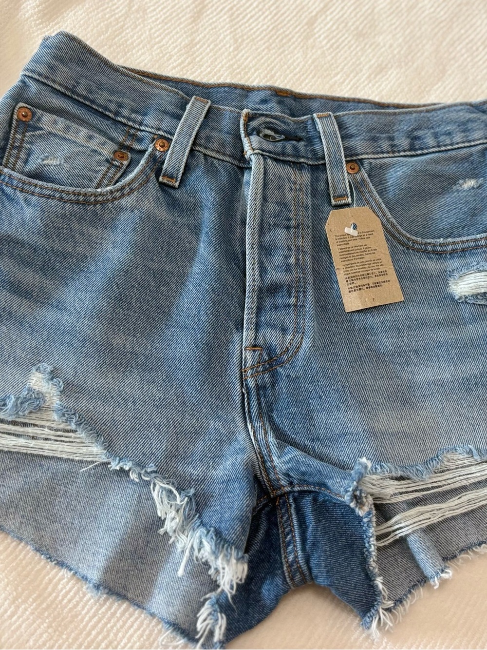 Levi's women’s Light Blue Distressed Jean Shorts